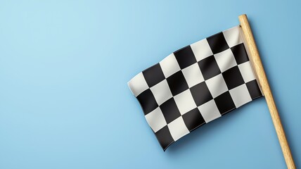 A checkered flag waving against a blue background, symbolizing the finish line in motorsport and racing events.