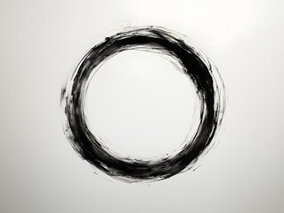 A circular brushstroke, symbolizing simplicity and completeness in art.
