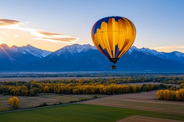 Obraz premium A couple enjoying a hot air balloon ride at sunrise, with sweeping views of green fields and distant mountains