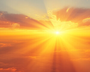 Fototapeta premium Softly blended yellow and orange sunset gradient with light rays, creating a warm and inviting atmosphere