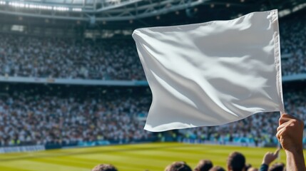 Flag waving in the hand of a fan at a sports stadium during a match, white blank background to fill copy space