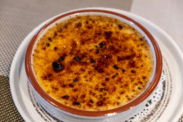 Creme Brulee, also known as burnt cream, a dessert with rich custard base and topped by caramel