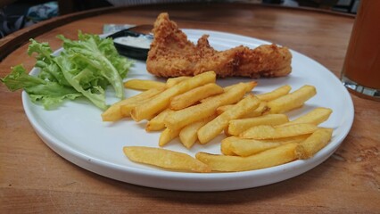 Crispy French Fries with Fried Chicken and Dipping Sauces