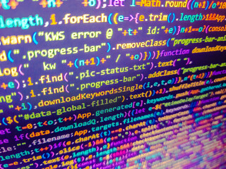 Programming code screen of software developer. Blue software developer background. Template of website, selective focus. Jquery code background. Developer display with source code. Blue color.