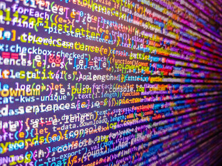 Abstract acrylic colors background. Digital technology industry concept development of programming and coding technologies. Colorful ceramic wall. Compressed javascript code on computer screen.