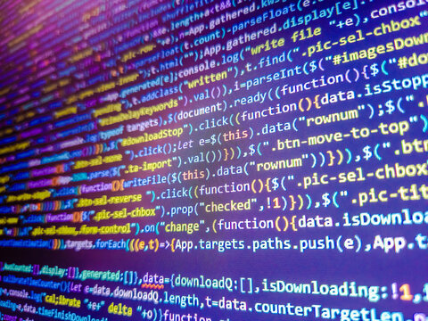 Background of program code. Color coding on screen. Computer code background. Abstract digital background featuring vibrant binary code in blue, purple, and orange tones. Web dewelopment.