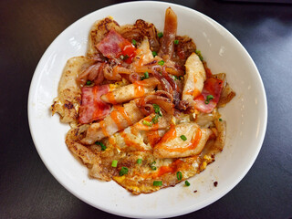 Stir-fried Rice Noodles with Chicken (Kuaitiao khua kai) with Chili Sauce Top View Image
