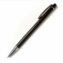 Shiny black and silver metal ballpoint pen resting on a pristine white background, ready for writing