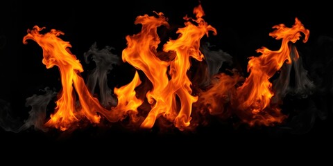 Fiery orange and yellow flames dance against a stark black background, creating a dramatic and intense visual spectacle