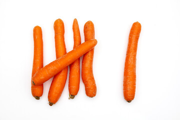 Counting Exercise: Six Fresh Carrots Isolated on White Background for Educational Use
