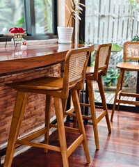 wooden chairs and tables in the coffee shop