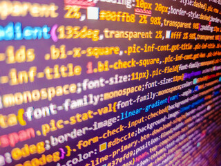 Code background. Developer display with source code. Software development monitor. Abstract screen of web developer. The code is seen from top to bottom and its part of an library. Pink color.