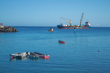 A ship and boats in the Moroni port