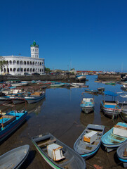 Grand Mosque in Moroni with boats in the foreground