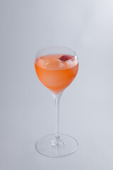 An Elegant Cocktail Displayed in a Beautiful Stemmed Glass with a Stylish Garnish