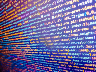Can be used for code background. Programming code abstract screen of software developer. Software development monitor screen background. Monitor technology concept. Blue unique background.