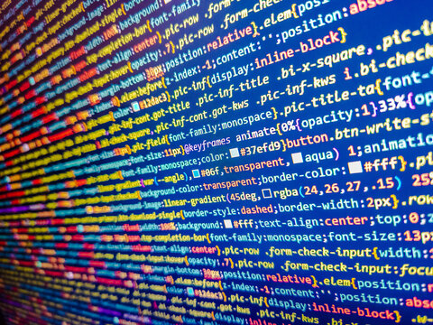 Sequence of numbers with bright colors on a black background. Virtual realtiy. Monitor with stock data, closeup. Light blue abstract  computer code. Screen with software developer code.