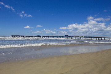 Destroyed fishing platform on Atlantida beach in southern Brazil