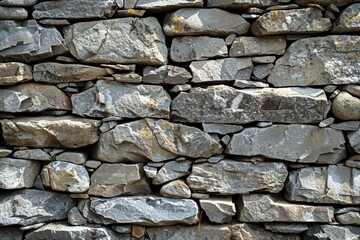 Photo of Old grey and brown long stone wall. Background texture for backdrops or mapping