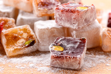 Sweet food Turkish delight, assorted rahat locum in form of cubes with nuts and powdered sugar, traditional food