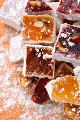 Sweet food Turkish delight, assorted rahat locum in form of cubes with nuts and powdered sugar, traditional food