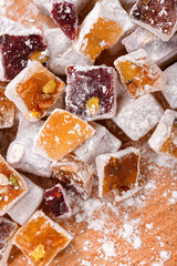 Sweet food Turkish delight, assorted rahat locum in form of cubes with nuts and powdered sugar, traditional food