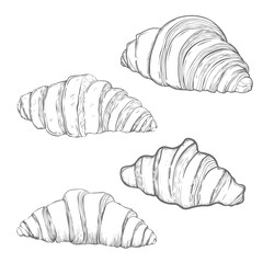 A set of croissants is ideal for a designer cafe. Hand drawn in vintage style. Vector illustration. Isolated, it is in the background.