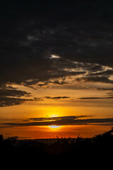 Dramatic sunrise with intense natural orange lights and idyllic dramatic scenery