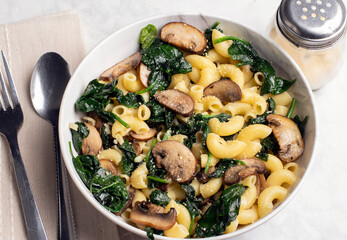 macaroni with  spinach,  and mushrooms