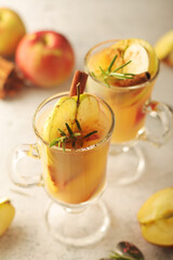 Warm apple autumn drink with cinnamon