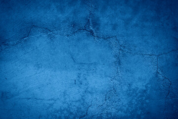 Vintage blue wall texture shoving abstract dirt cement surface with cracks