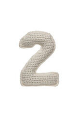 A crocheted number 2, soft and textured, isolated on a white background.