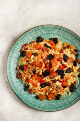 rice dish with dried fruits, nuts and spices of Middle Eastern cuisine, homemade, no people,