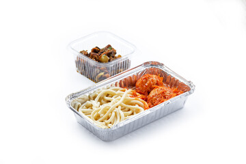a white background disposable plastic and foil tableware airplane food snack boiled vermicelli with dumplings fried vegetables healthy eating