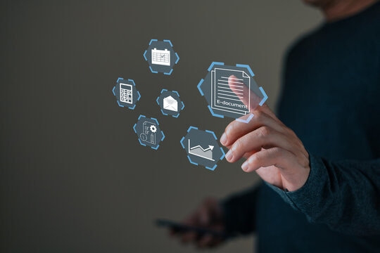 A person interacts with a digital interface displaying icons like e-documents, charts, and calendars, symbolizing technology, data management, and efficient virtual office solutions.