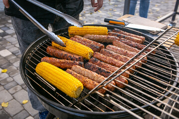 grilled meat, steak, baked corn, barbecue, guests, picnic. nature, food, delicious