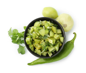 Delicious homemade green salsa and ingredients isolated on white, top view