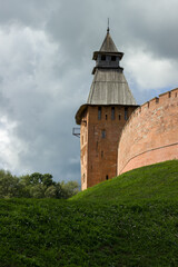 Obraz premium The Kremlin of Veliky Novgorod on a green field