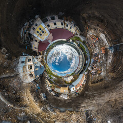 blue sphere inside overlooking old town, urban development, historic buildings and crossroads with cars. Transformation of spherical 360 panorama in abstract aerial view.
