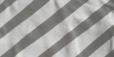 Unique shadow texture with diagonal stripes on a light surface creating an abstract visual effect