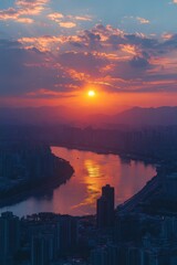 Fototapeta premium Vibrant city skyline illuminated under colorful sunset with mountains in the background