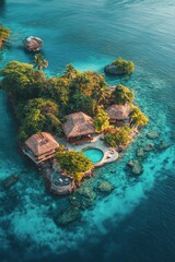 Fototapeta premium Tropical island retreat with bungalows surrounded by clear turquoise waters