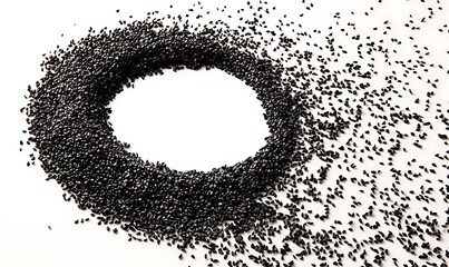 Black sesame seeds arranged in a circular frame