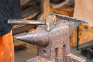 Old Anvil with Hammer in the Blacksmith Shop