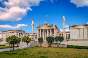 Obraz premium The Academy and the University of Athens, in Panepistimiou St., in Athens, Greece. It is part of the architectural Athenian trilogy, designed in 1859 by the Danish architect T. Hansen.