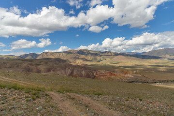 Fototapeta premium Altai Mars number one (multicolored mountains). Kyzyl Chin valley, also called as Mars valley. Chagan Uzun village, Altai republic, Russia. 