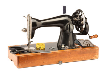 Sewing machine with measuring tape, scissors and spools of threads isolated on white