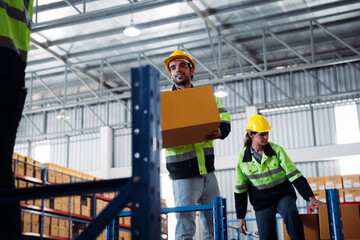 The staff is working in the office document storage area. The warehouse workers are checking the stock on the shelves in the production department.