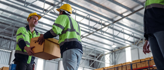 The staff is working in the office document storage area. The warehouse workers are checking the stock on the shelves in the production department.