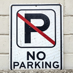 A no parking sign board, typically displaying a red circle with a diagonal line